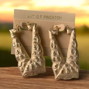 Gold Textured Earrings with Sculptural Accents that look like animal print